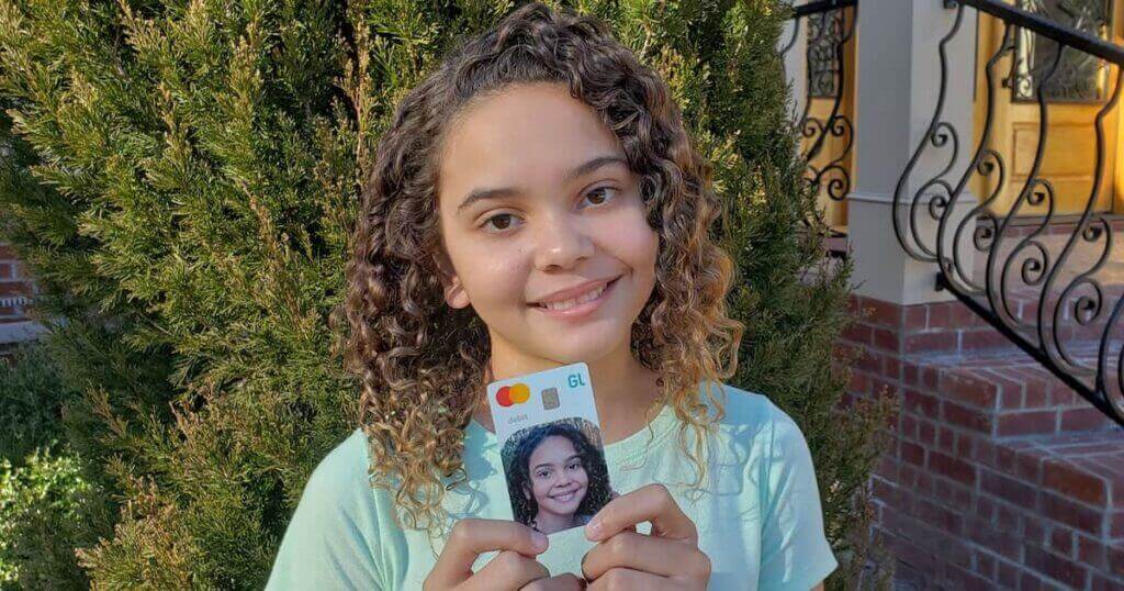 Picture of girl holding Greenligt Card