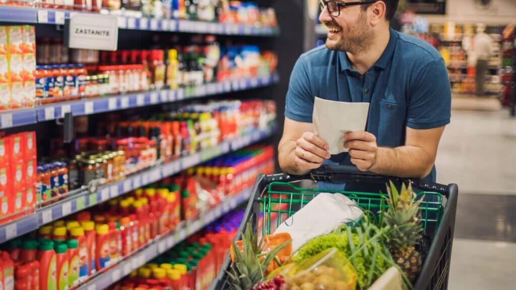 Picture of Man shopping in Walmart with Walmart Money Card